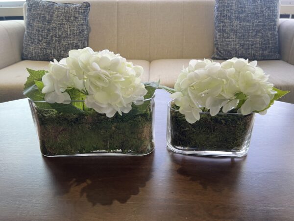 White florals in clear glass planters