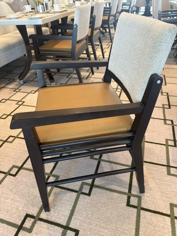 Dark wood dining chair with upholstered seat and seatback in grey twill material